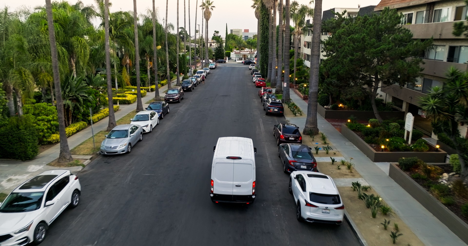 White Delivery Van on Residential Street in LA